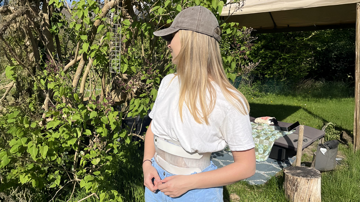Astrid with spinal brace wide