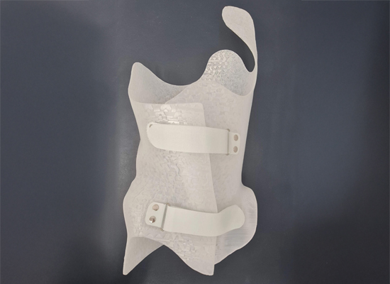 Corset rigid spinal brace