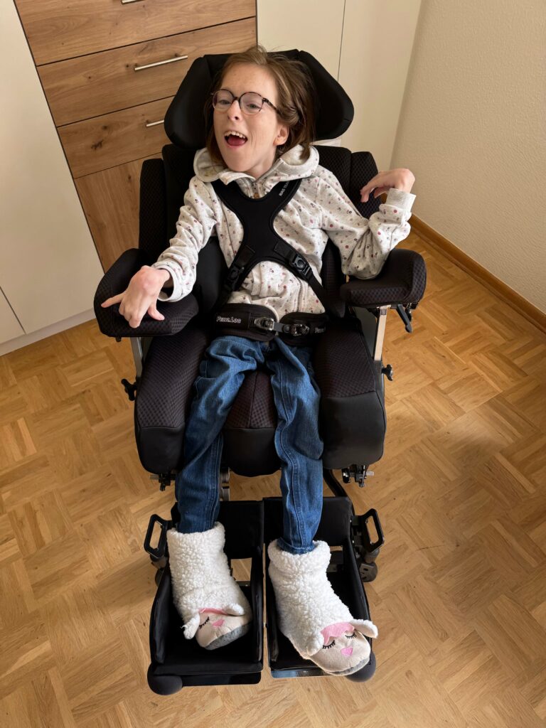 Esther in a 3D printed seat