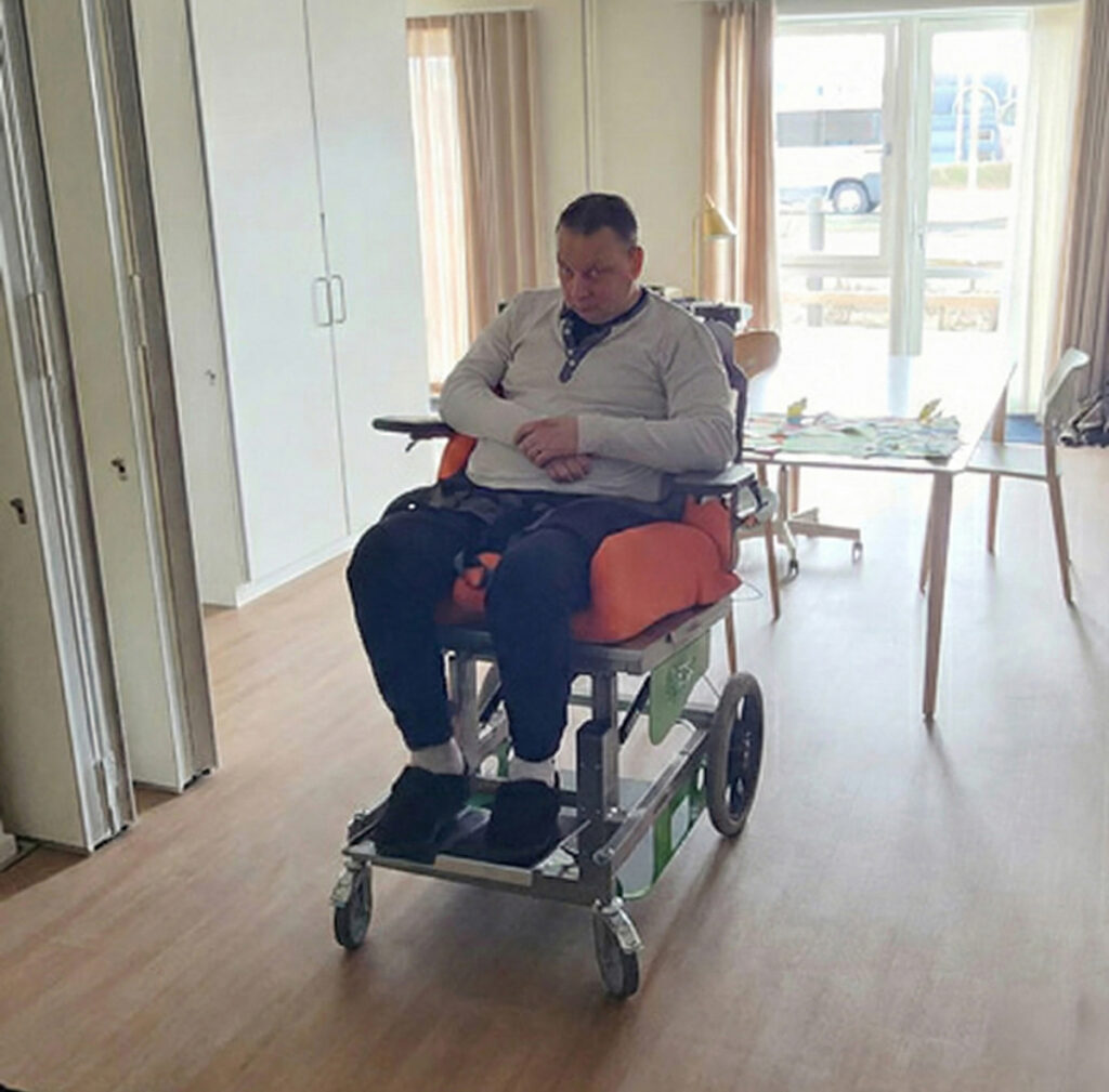 Aalborg Municipality user in 3D printed wheelchair