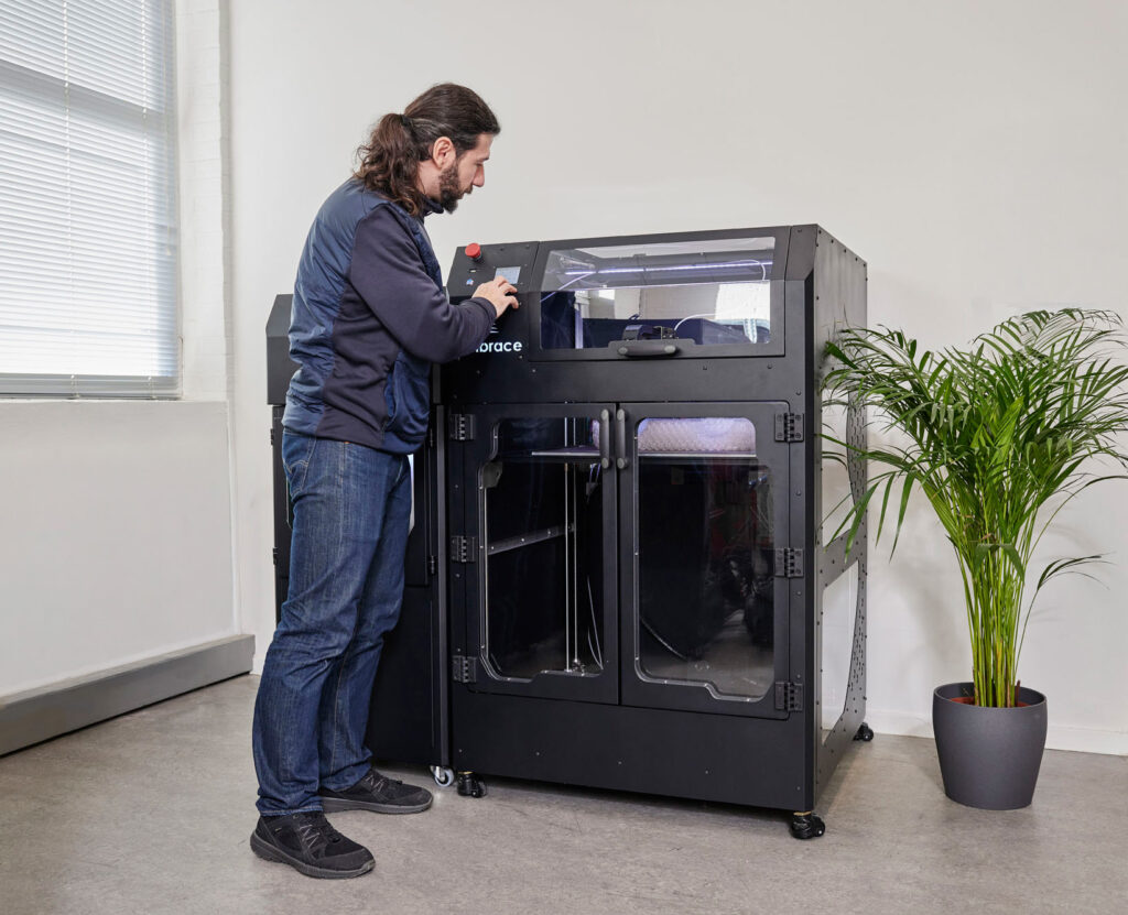 Man operating Embrace printer